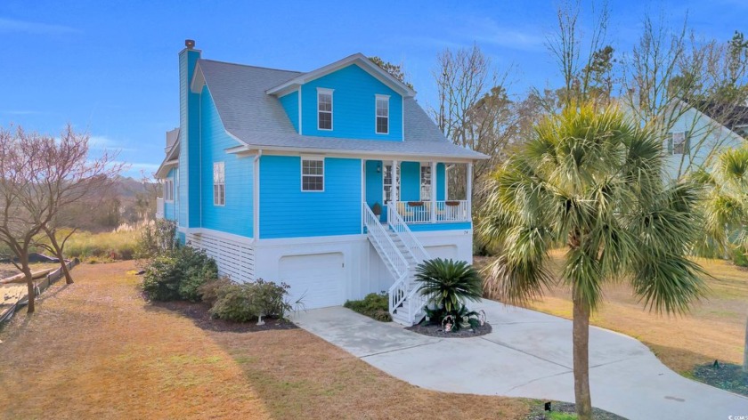 Nestled in the serene Marsh Point community of Pawleys Island - Beach Home for sale in Pawleys Island, South Carolina on Beachhouse.com