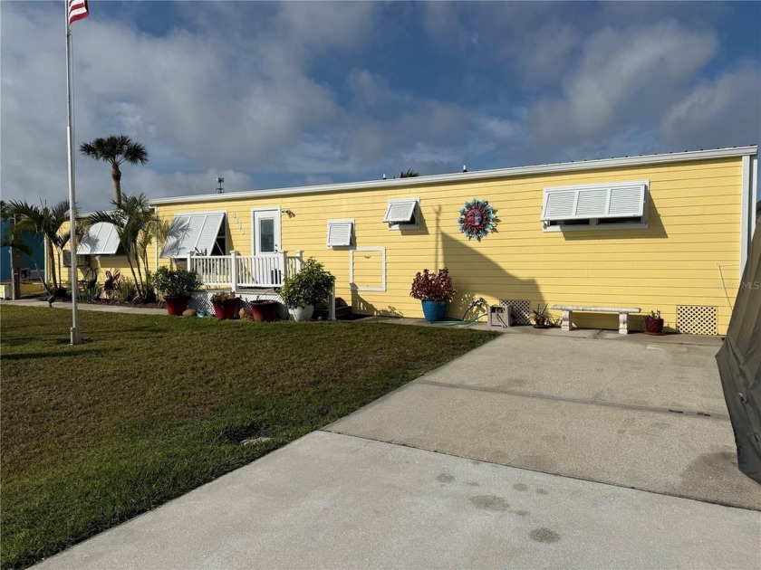 This 4-bedroom, 3-bathroom residence sits on a deep-water canal - Beach Home for sale in Port Charlotte, Florida on Beachhouse.com