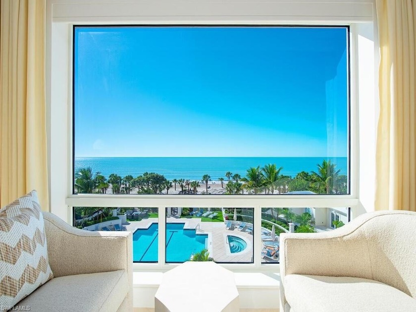 Experience elevated beachfront living in this beautifully - Beach Condo for sale in Naples, Florida on Beachhouse.com