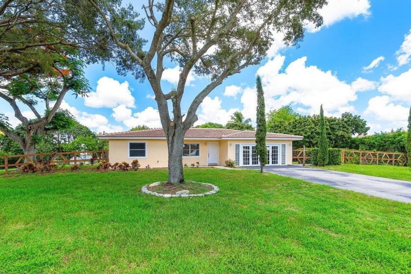 Nestled in the serene community of Melrose Park. This hidden gem - Beach Home for sale in Boynton Beach, Florida on Beachhouse.com