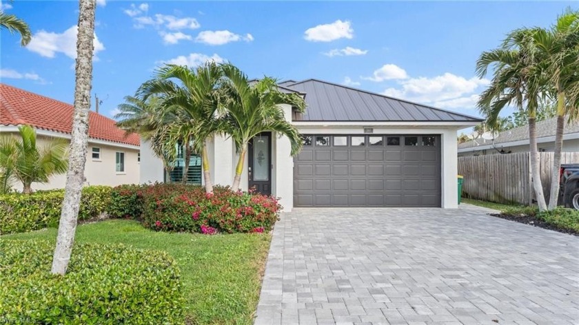This fully remodeled 4-bedroom, 2-bathroom home offers modern - Beach Home for sale in Naples, Florida on Beachhouse.com