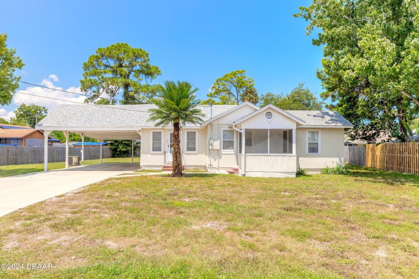 This 3 Bedroom home is situated on a huge 100 X 125 lot with NO - Beach Home for sale in Port Orange, Florida on Beachhouse.com