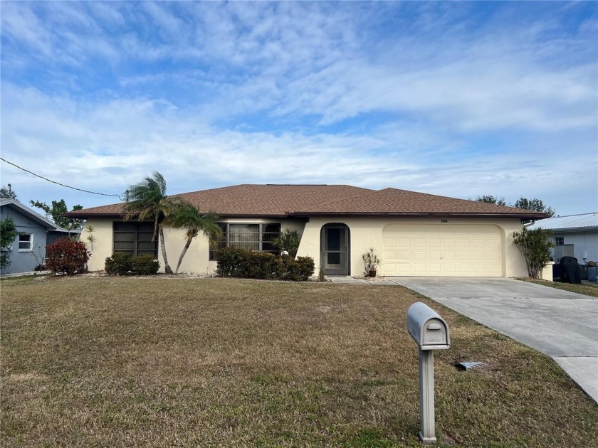 YOUR TROPICAL PARDISE AWAITS.   This spacious 2 bed 2 bath gulf - Beach Home for sale in Port Charlotte, Florida on Beachhouse.com