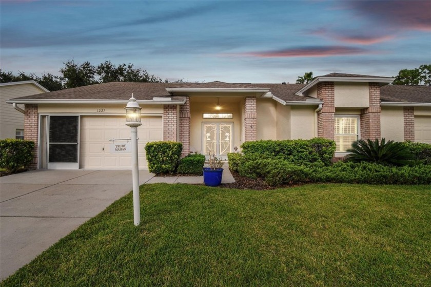 One or more photo(s) has been virtually staged. Situated in - Beach Home for sale in Trinity, Florida on Beachhouse.com