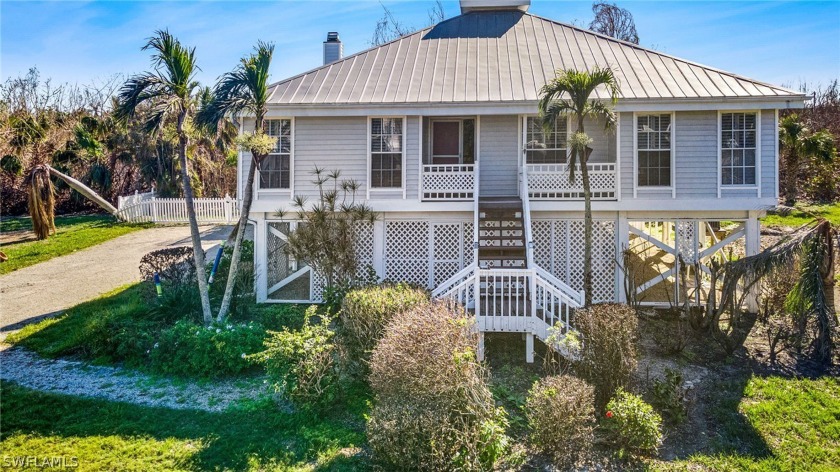 This beautiful Old Florida-inspired home in Sanibel's popular - Beach Home for sale in Sanibel, Florida on Beachhouse.com