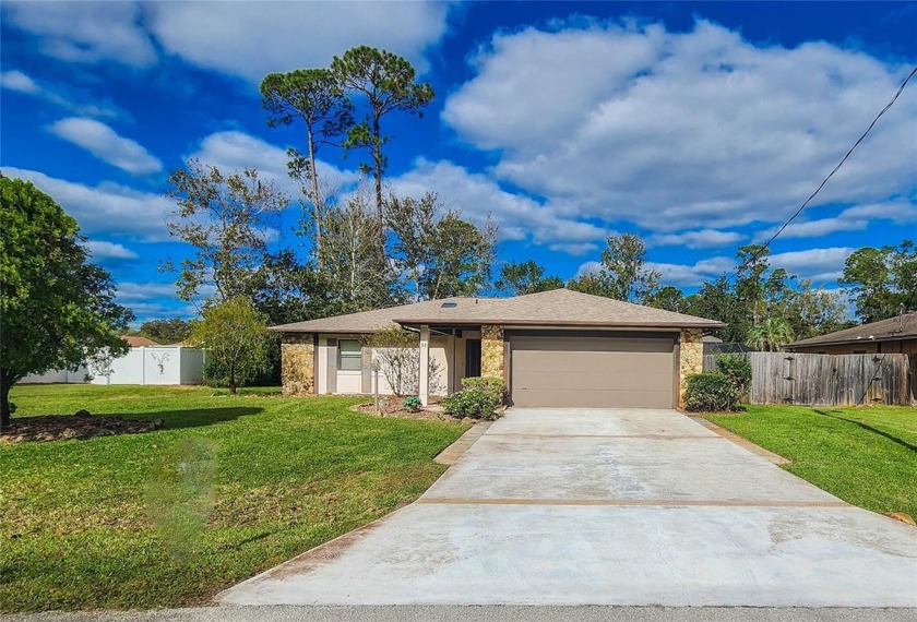 This property is located just 10 minutes from the beach and a - Beach Home for sale in Palm Coast, Florida on Beachhouse.com