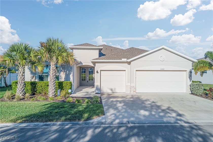 Elegant and expansive, this refined residence offers 3 bedrooms - Beach Home for sale in Lehigh Acres, Florida on Beachhouse.com