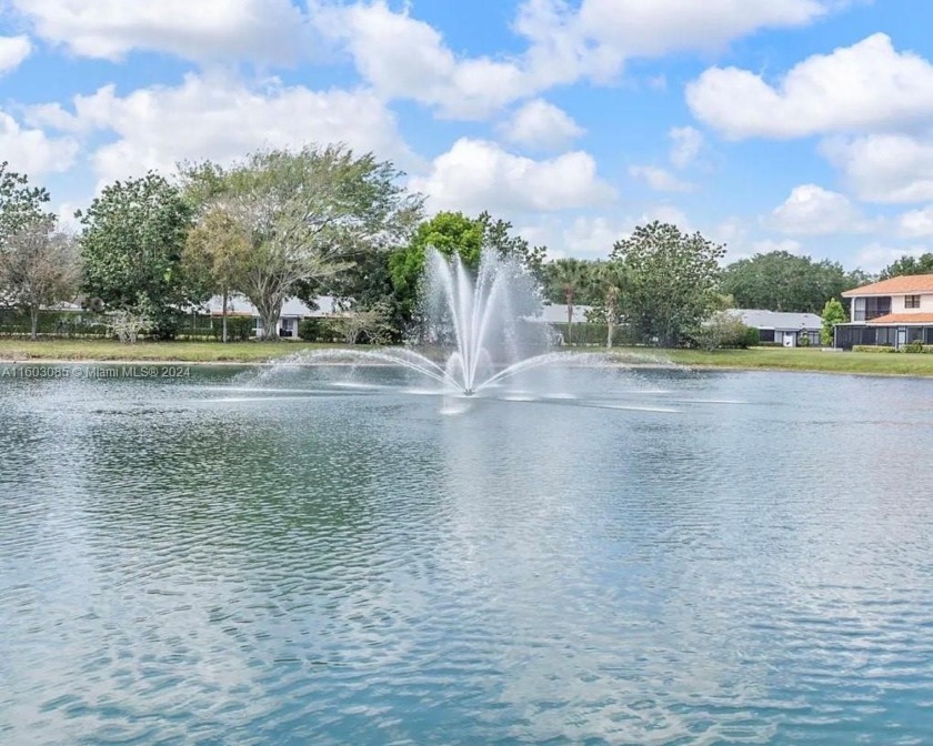 This enchanting single family one story lake front home in Boca - Beach Home for sale in Boca Raton, Florida on Beachhouse.com