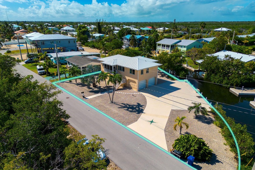 This immaculate, well-maintained concrete home sits on a 12,014 - Beach Home for sale in Big Pine Key, Florida on Beachhouse.com