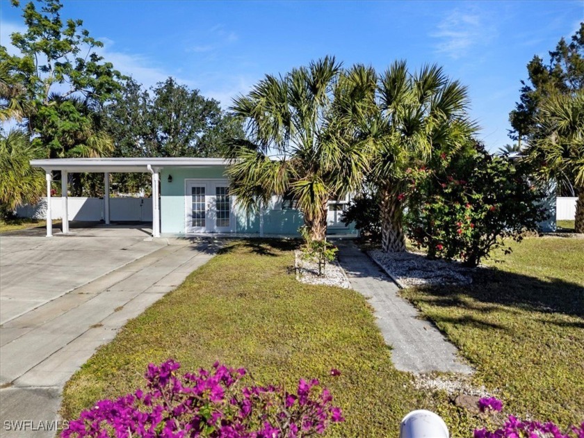 Welcome to your dream waterfront oasis on a tranquil canal with - Beach Home for sale in Port Charlotte, Florida on Beachhouse.com