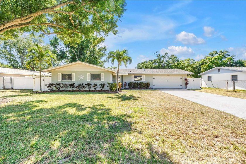 This fully renovated pool home less than 5 minutes from the - Beach Home for sale in Largo, Florida on Beachhouse.com
