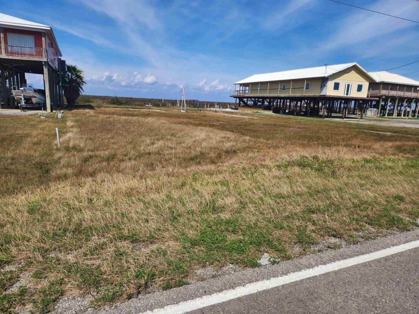 This waterfront vacant lot is 100' wide along the bay & measures - Beach Lot for sale in Grand Isle, Louisiana on Beachhouse.com