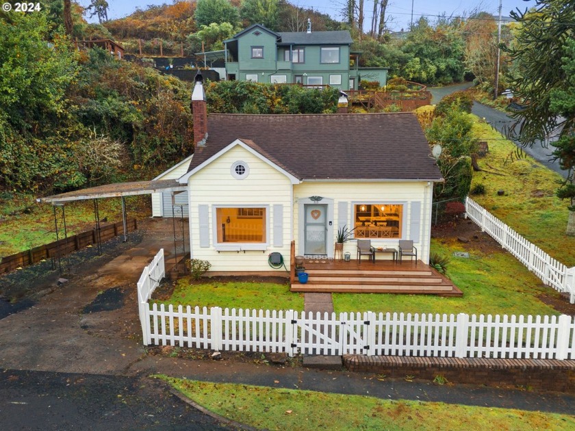 Nestled in a peaceful wooded setting, this home offers the - Beach Home for sale in Astoria, Oregon on Beachhouse.com