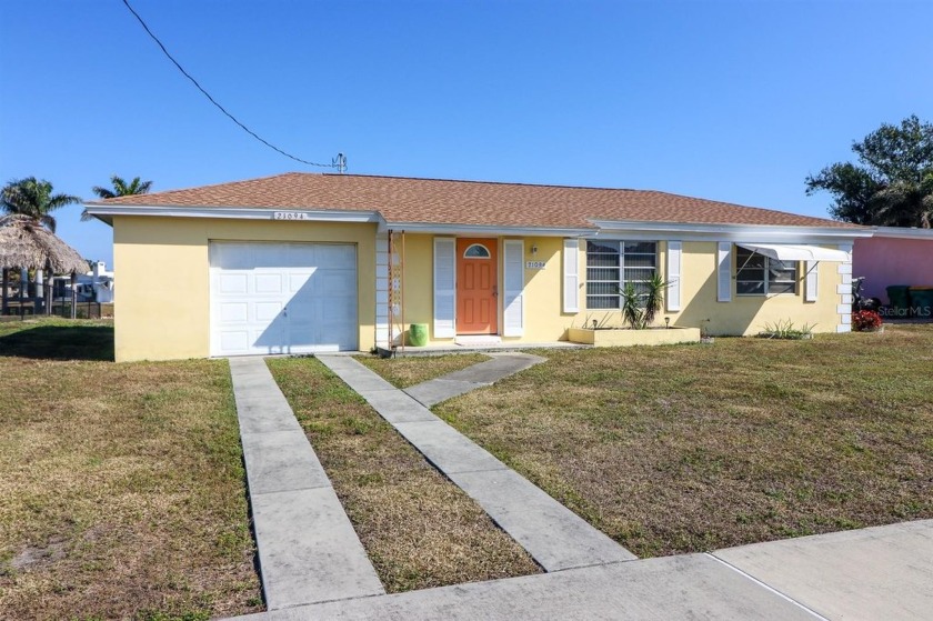 This charming mid-century modern 2-bedroom, 1-bathroom, 1-car - Beach Home for sale in Port Charlotte, Florida on Beachhouse.com