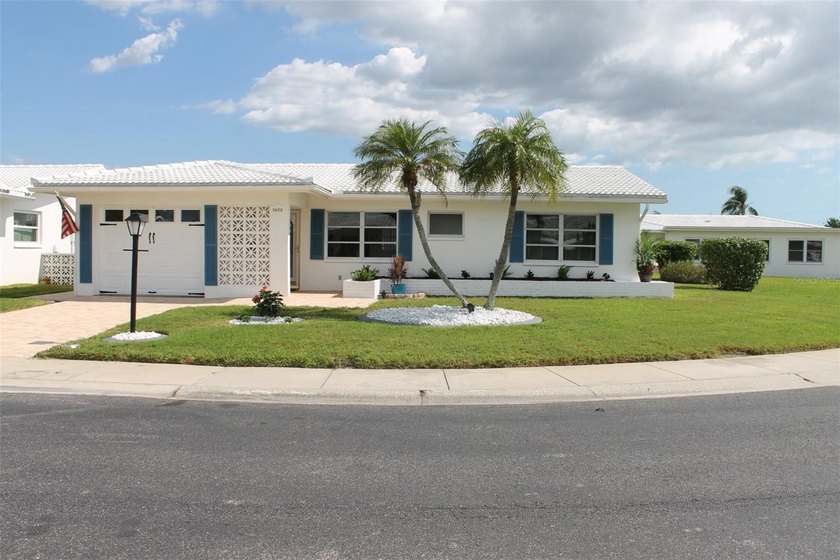 Beautifully Landscaped Curb Appeal at this Single-Family Home's - Beach Home for sale in Pinellas Park, Florida on Beachhouse.com