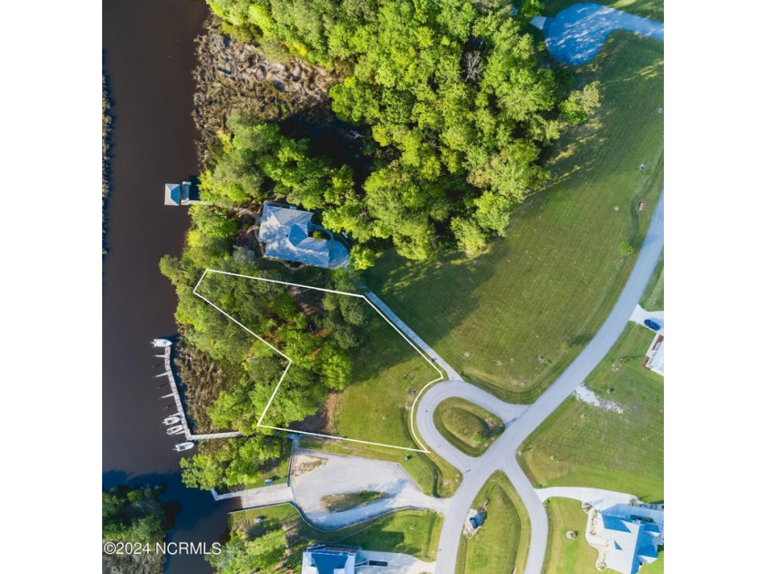 This large, elevated CREEKFRONT lot is the perfect setting for - Beach Lot for sale in Minnesott Beach, North Carolina on Beachhouse.com