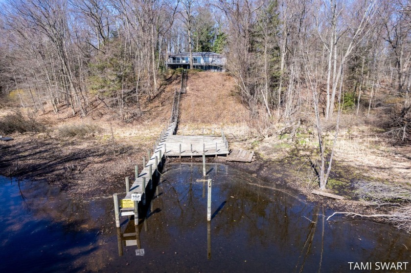 Escape to your own private paradise with this sprawling - Beach Home for sale in Spring Lake, Michigan on Beachhouse.com