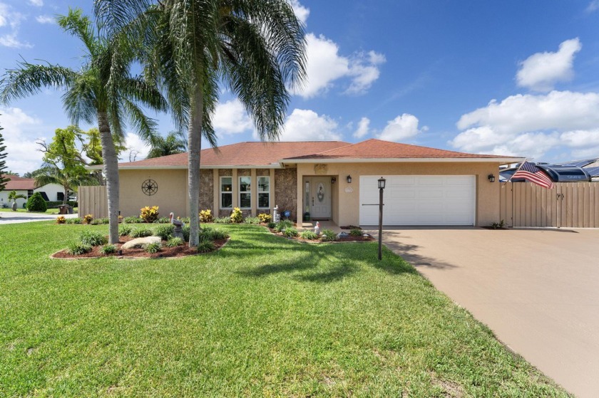 Welcome to this beautiful 3-bedroom, 2-bathroom, 2-car garage - Beach Home for sale in Lake Clarke Shores, Florida on Beachhouse.com