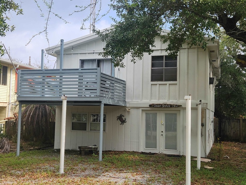 This 2 bed / 2 bath inland home is nestled in mature oak trees - Beach Home for sale in Grand Isle, Louisiana on Beachhouse.com