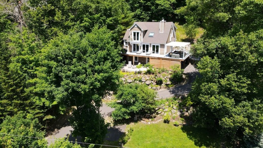 AAA Location - This unique mountain home offers a truly - Beach Home for sale in Mont-Tremblant,  on Beachhouse.com