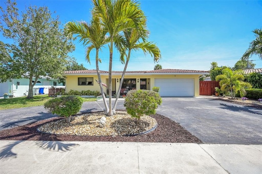 BEST DEAL IN GARDEN ISLES! DISCOVER THIS WELL-MAINTAINED - Beach Home for sale in Pompano Beach, Florida on Beachhouse.com