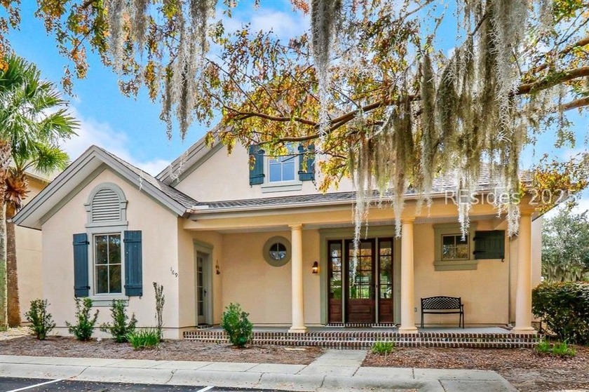 Discover refined, low-maintenance living in this fully furnished - Beach Home for sale in Bluffton, South Carolina on Beachhouse.com