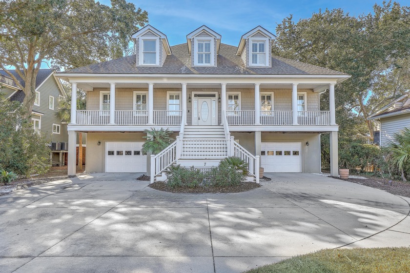 Tucked away on a quiet Isle of Palms street, this beautifully - Beach Home for sale in Isle of Palms, South Carolina on Beachhouse.com