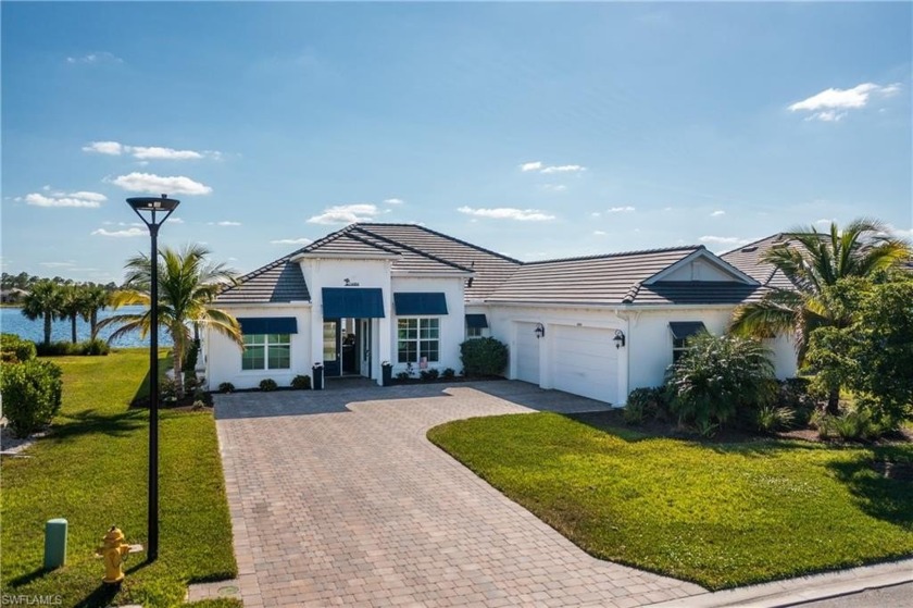 Stunning Bougainvillea model that sits on 99 feet of lakefront - Beach Home for sale in Fort Myers, Florida on Beachhouse.com