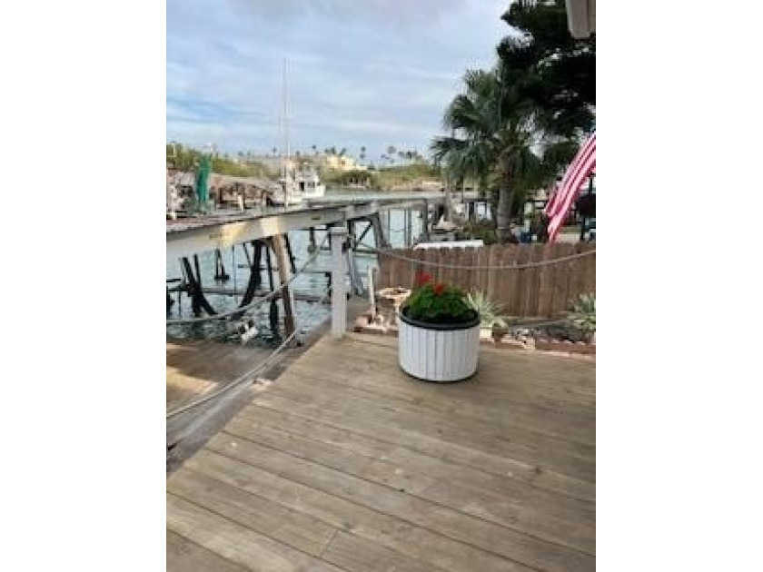 This cottage WATERFRONT home is waiting for you to make it your - Beach Home for sale in Port Isabel, Texas on Beachhouse.com