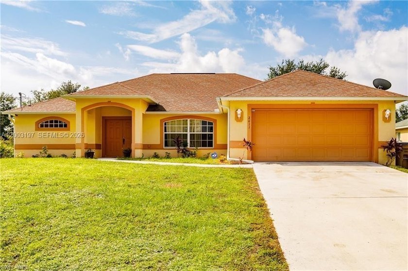 Discover the perfect blend of space, comfort, and elegance in - Beach Home for sale in Lehigh Acres, Florida on Beachhouse.com