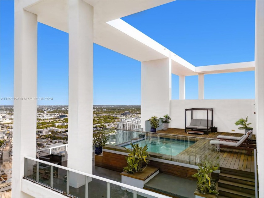 Immerse yourself in breathtaking 180-degree vistas from this - Beach Condo for sale in Miami, Florida on Beachhouse.com