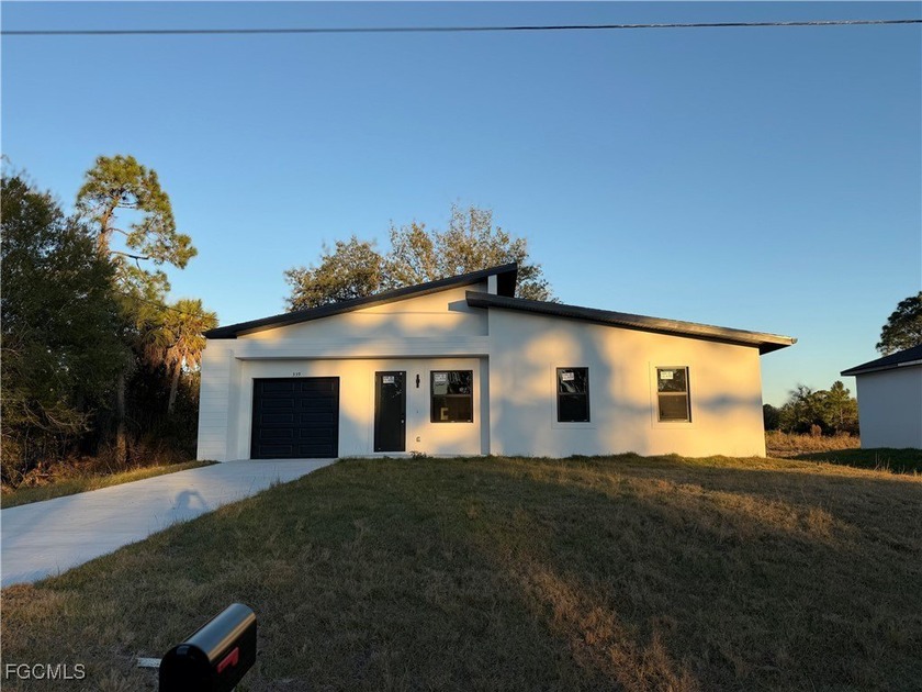 NEW CONSTRUCTION!! Fully impact doors and windows, gorgeous home - Beach Home for sale in Lehigh Acres, Florida on Beachhouse.com
