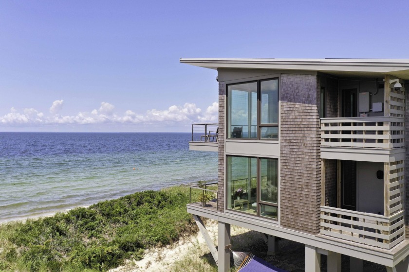 Introducing a truly extraordinary oceanfront oasis! Nestled in - Beach Home for sale in Falmouth, Massachusetts on Beachhouse.com
