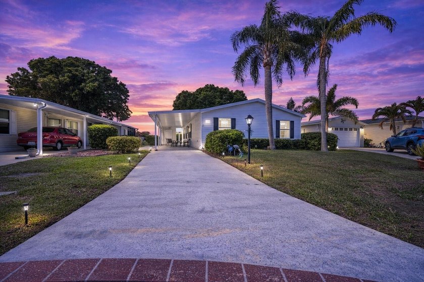 This fantastic 3/2 sits right on the lake, and the view is - Beach Home for sale in Port Saint Lucie, Florida on Beachhouse.com