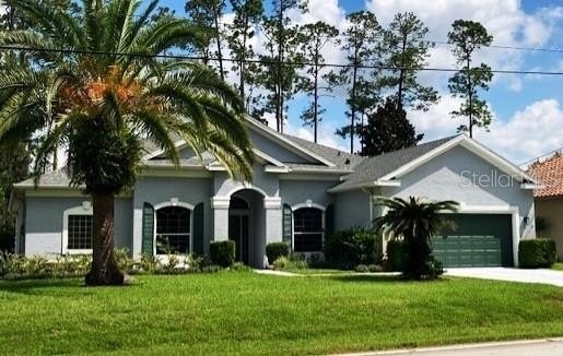 PICTURESQUE TRANQUILITY ON THE GOLF COURSE! 
An immaculate gem - Beach Home for sale in Palm Coast, Florida on Beachhouse.com