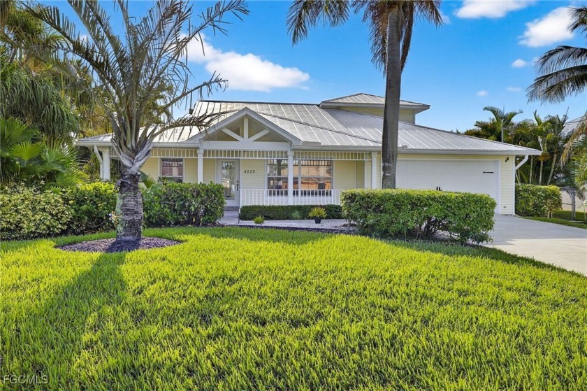 Welcome to this beautifully maintained Key West-style Gulf - Beach Home for sale in Cape Coral, Florida on Beachhouse.com