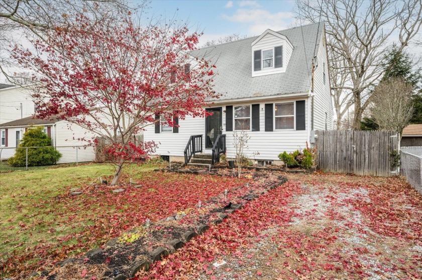 Welcome to this 4-bedroom, 1.5-bath Cape-style home in the heart - Beach Home for sale in Brookhaven, New York on Beachhouse.com