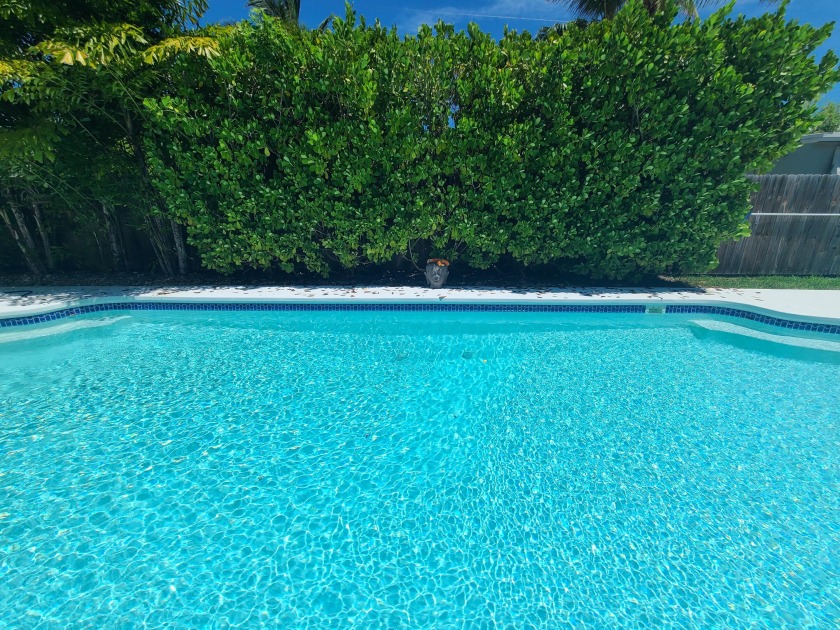 Tropical Pool Home in the Heart of Key Largo! This property - Beach Home for sale in Key Largo, Florida on Beachhouse.com