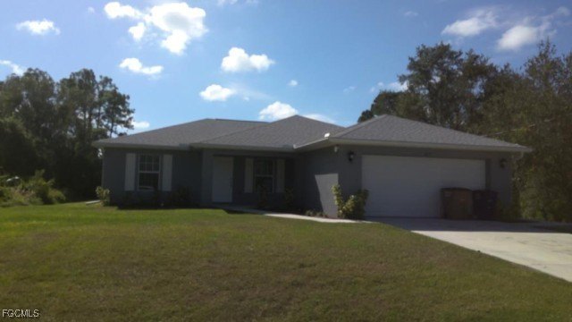 Beautiful 3-bedroom, 2-bath home featuring an open-concept - Beach Home for sale in Lehigh Acres, Florida on Beachhouse.com
