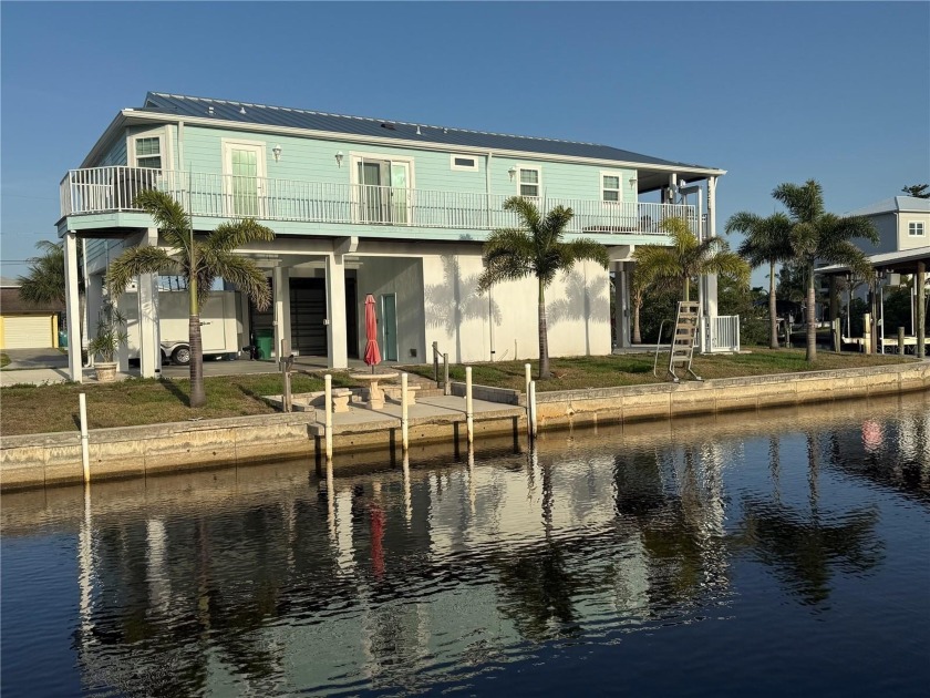 Experience the essence of Florida coastal living in this fully - Beach Home for sale in Port Charlotte, Florida on Beachhouse.com