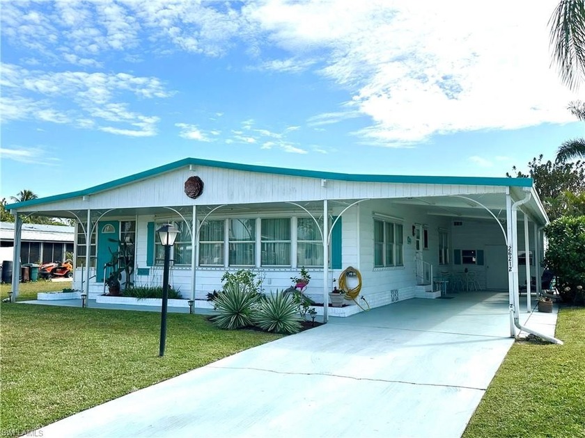 Welcome to this delightful 2-bedroom, 2-bath home, located on - Beach Home for sale in Bonita Springs, Florida on Beachhouse.com