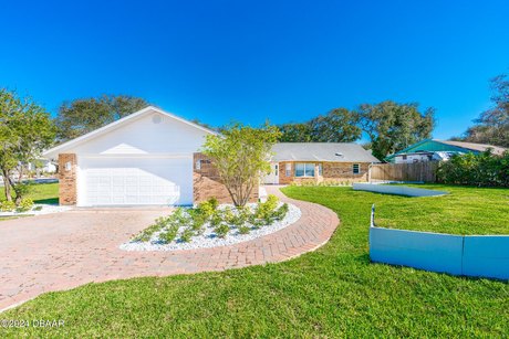 This beachside oasis, nestled in the highly sought-after south - Beach Home for sale in Ponce Inlet, Florida on Beachhouse.com