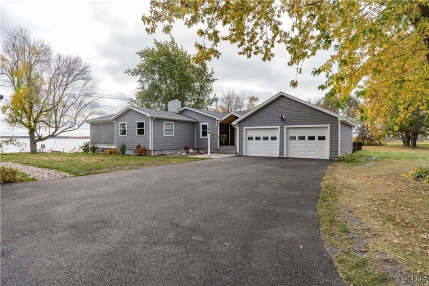 PRIVATE LAKEFRONT RANCH WITH OVER 300' OF TRANQUIL WATERFRONT! - Beach Home for sale in Lyme, New York on Beachhouse.com