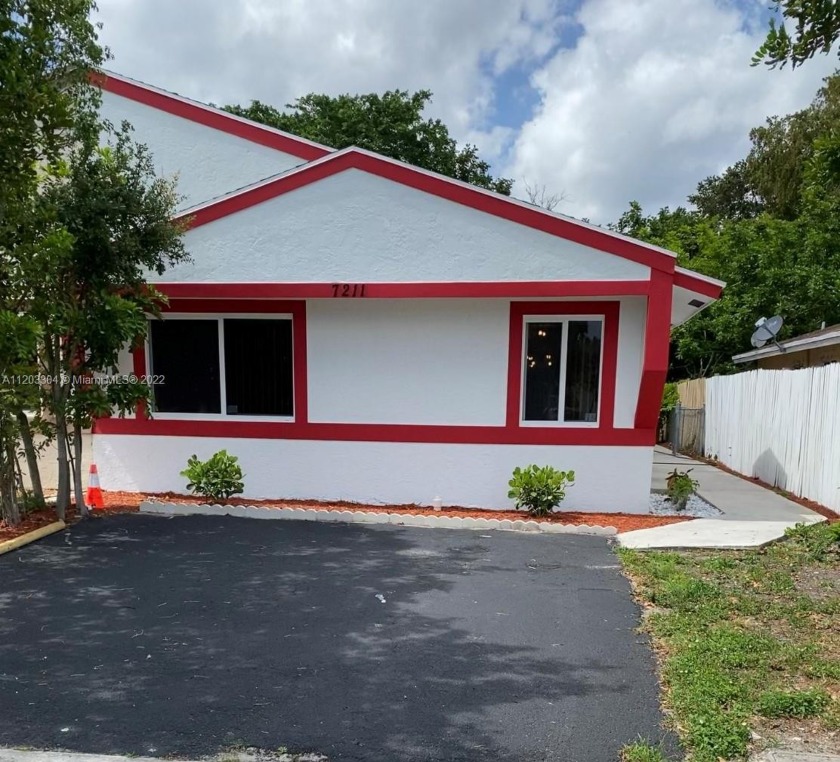 Charming 3 bedroom, 2 bath home w/ a den centrally located in - Beach Home for sale in North  Lauderdale, Florida on Beachhouse.com