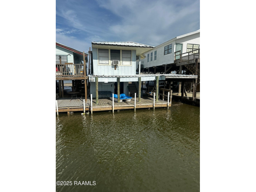 Located in the hotly desired community of Coco Marina, this camp - Beach Home for sale in Chauvin, Louisiana on Beachhouse.com