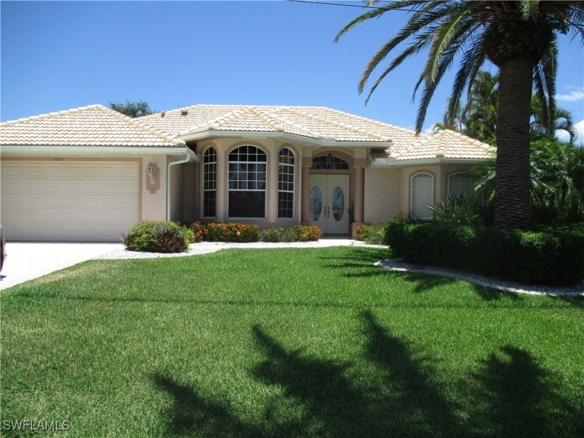 DIRECT SAILBOAT ACCESS POOL HOME Located in a highly desired - Beach Home for sale in Cape Coral, Florida on Beachhouse.com