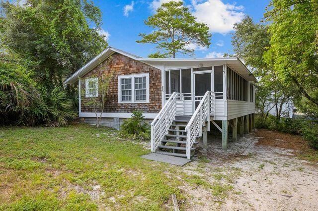 Charming  beach cottage located in quiet neighborhood in Blue - Beach Home for sale in Santa Rosa Beach, Florida on Beachhouse.com