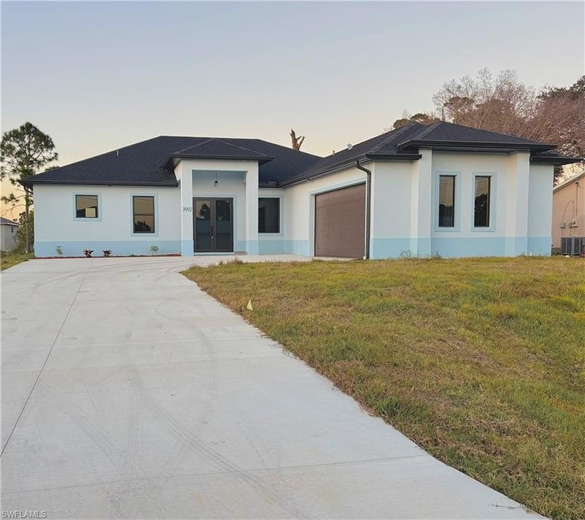 Experience refined living in this immaculate 3-bedroom + den - Beach Home for sale in Lehigh Acres, Florida on Beachhouse.com