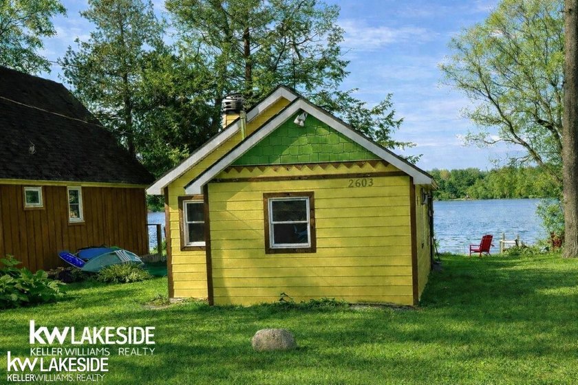 Enjoy private lake living in this charming 1-bedroom, 1-bath - Beach Home for sale in Traverse City, Michigan on Beachhouse.com