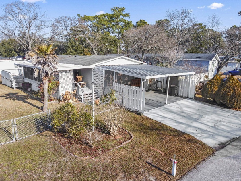 This charming 3-bedroom, 2-bath home is located in Crystal Lake - Beach Home for sale in Myrtle Beach, South Carolina on Beachhouse.com